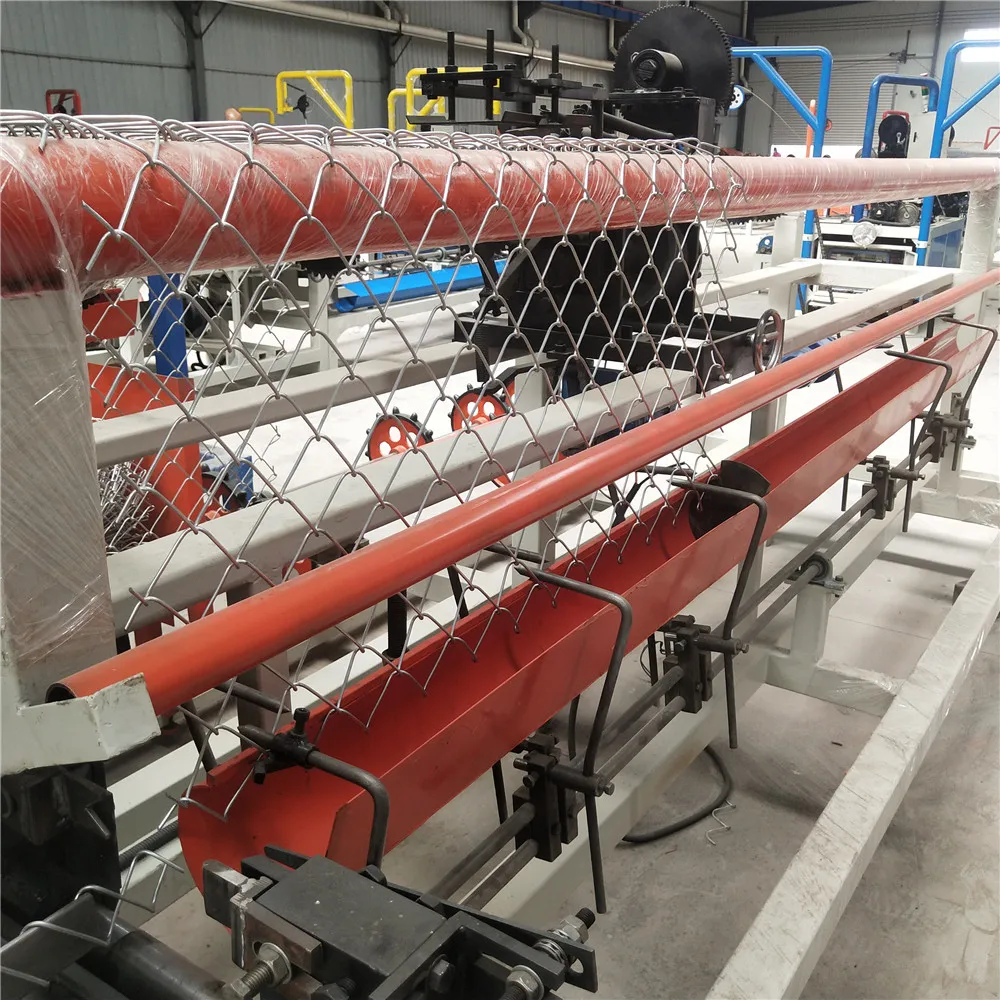India Fully automatic spare parts manufacture price Diamond pvc wire mesh chain link fencing net making machine in