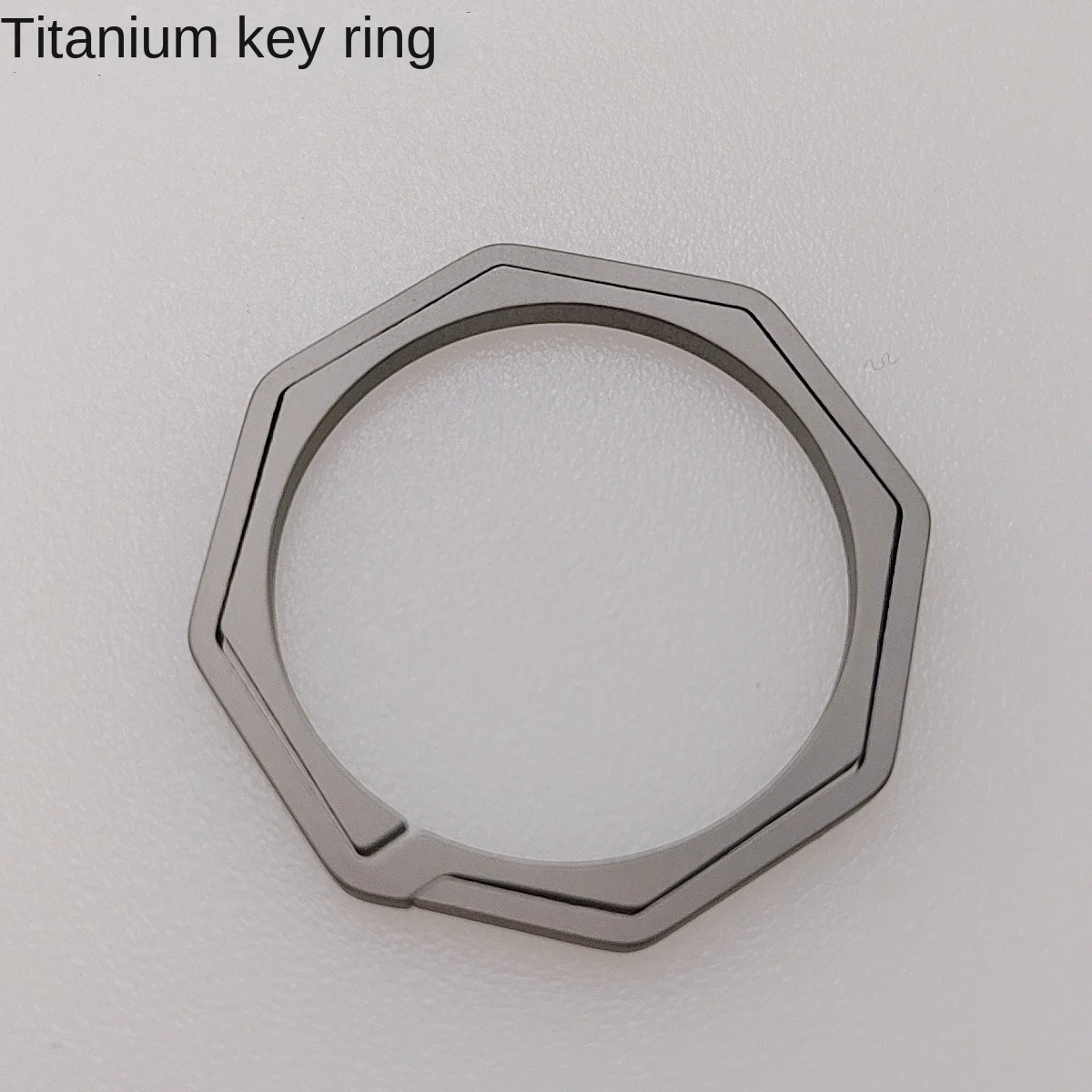custom key chain 25mm30mm popular titanium alloy car key chains 2024 new model Octagonal shape metal key chains