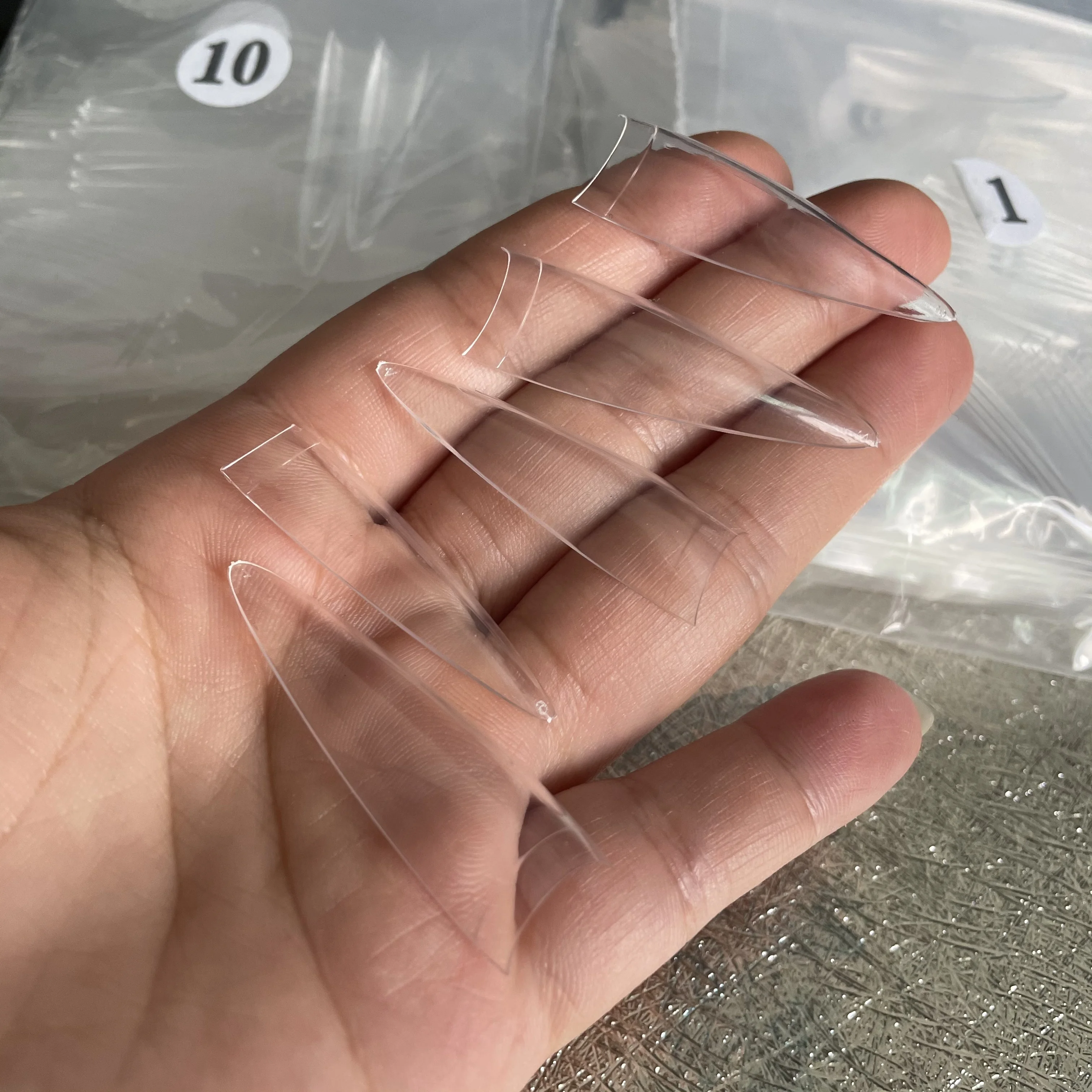 504Pcs XXL Long Stiletto Half Coverage Clear Nail Tips High Quality ABS Material XL Almond Finger Nails For Wholesale