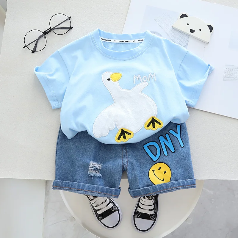 Clothing factory wholesale 2024 high quality fashion cartoon printed round neck children short sleeve and shorts two sets