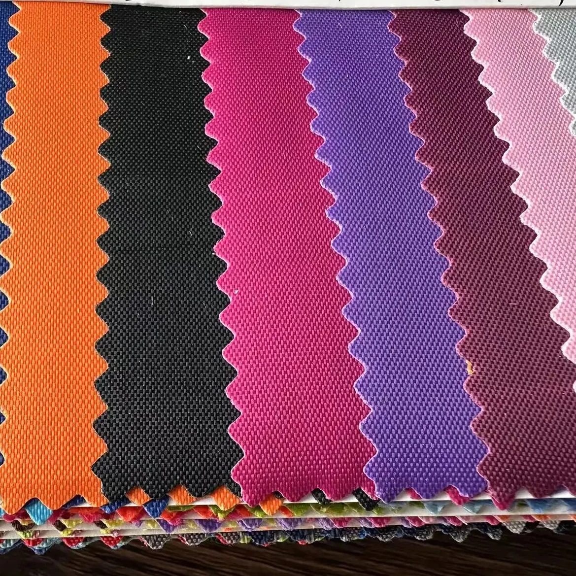 Wholesale 210D polyester high density oxford fabric with PU coating for raincoat fabric