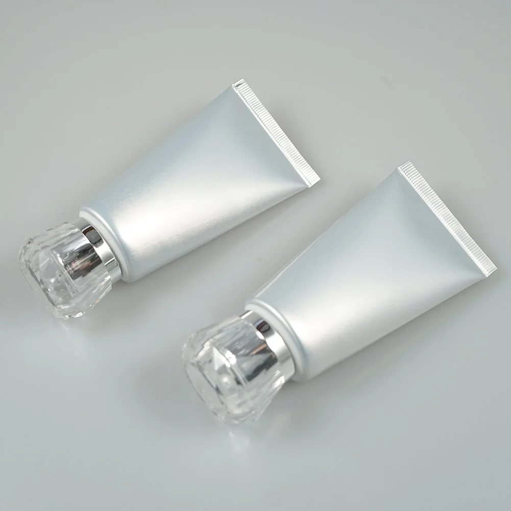 
100g/ml silver cosmetic tube with acrylic luxury cover ;Makeup sample soft container tube,For lotion facial cleaning cream 