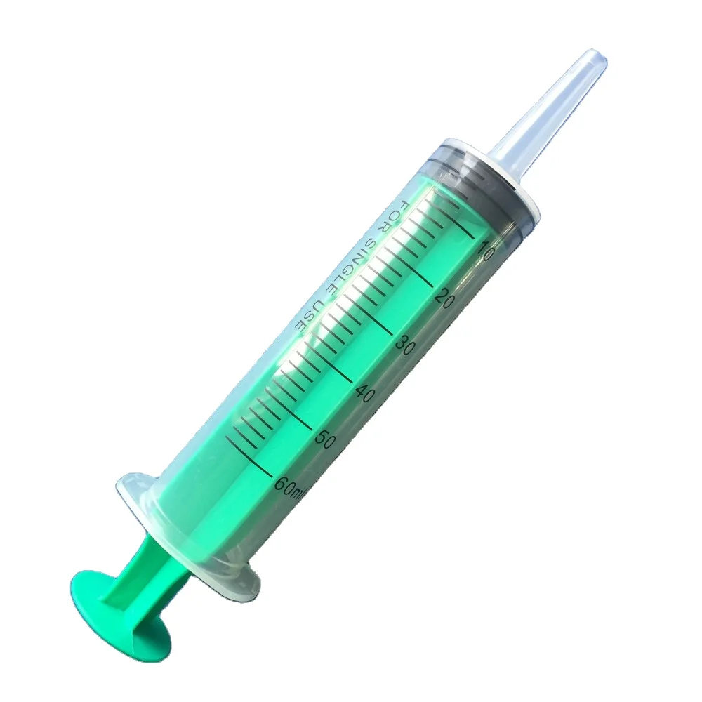 Disposable plastic syringe with colored plunger