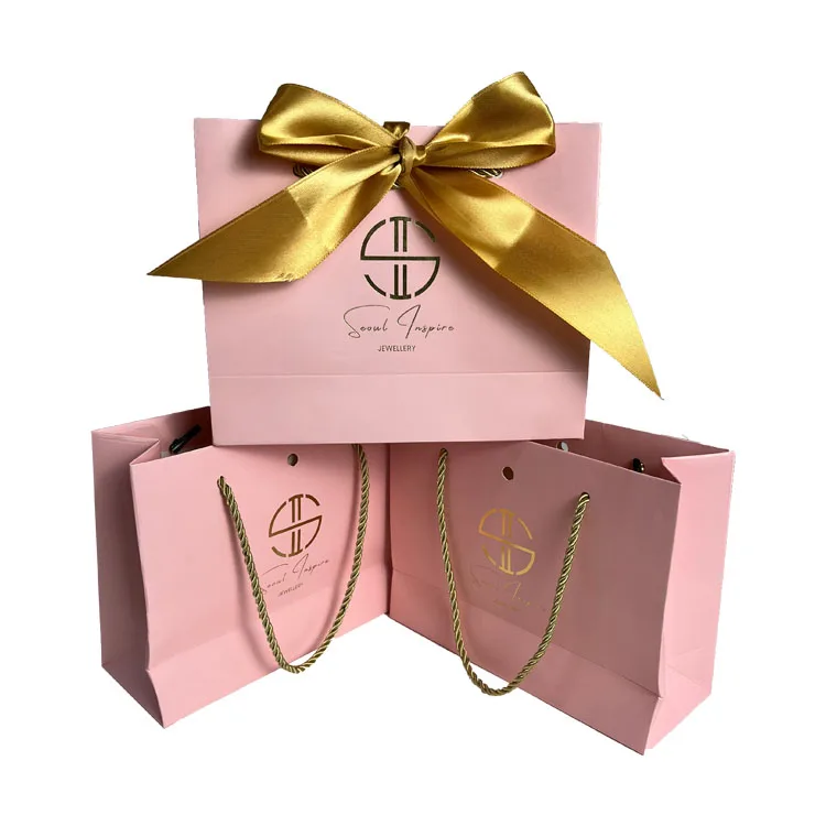 New good quality reusable luxury embossed golden gift paper bags with ribbon handle