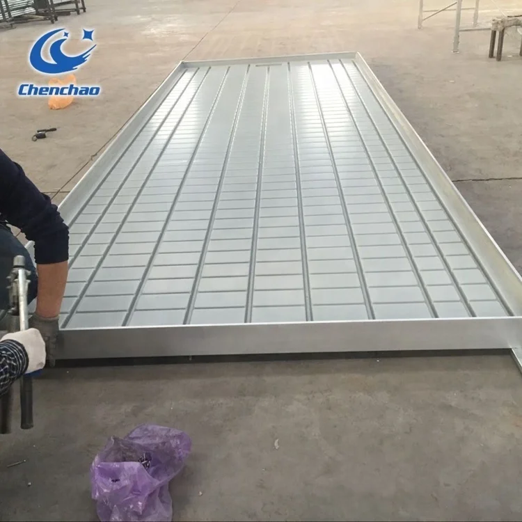 Greenhouse Structure With Flood And Drain Hydro Table