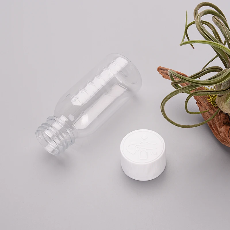 Wholesale 50ml 60ml 100ml dark amber Transparent plastic empty PET customized Oval medicine Liquid syrup Bottle with CRC Cap