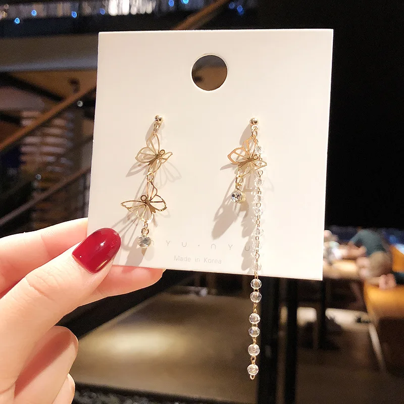 Han Jue jewelry factory thin Bow Earrings female long style asymmetric tassel high sense Korean Earrings