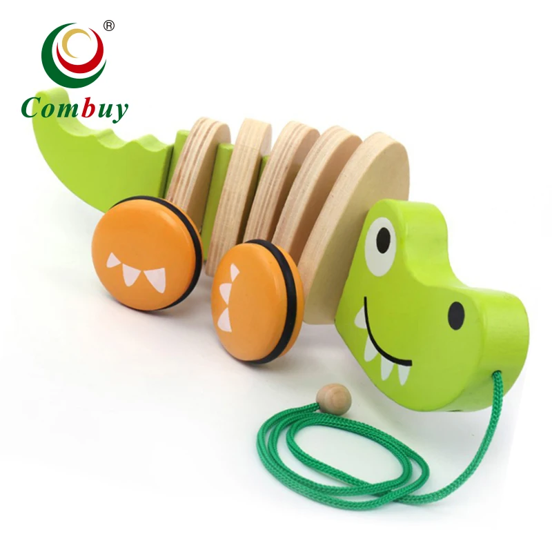 Puppy crocodile dragging along baby toddler pull toy wooden
