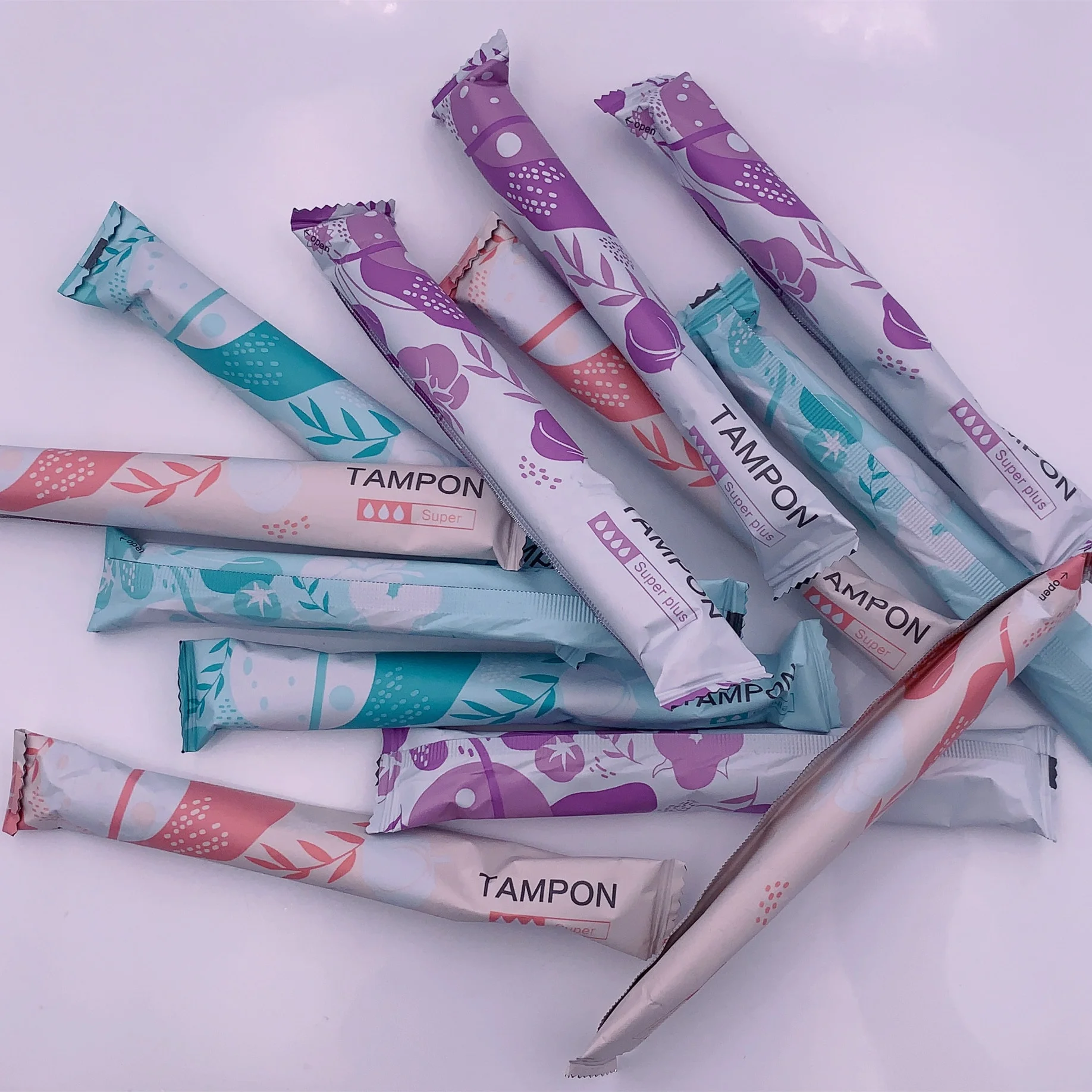 Factory direct supply vaginal cleaning encreur custom logo free soft plastic applicator tampon organic tampons