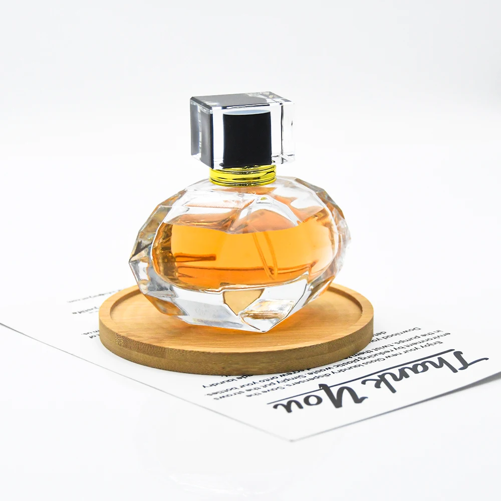 Wholesale Customization 70ml Diamond-Shaped Perfume Glass Bottle With Gold Silver Acrylic Caps With Box