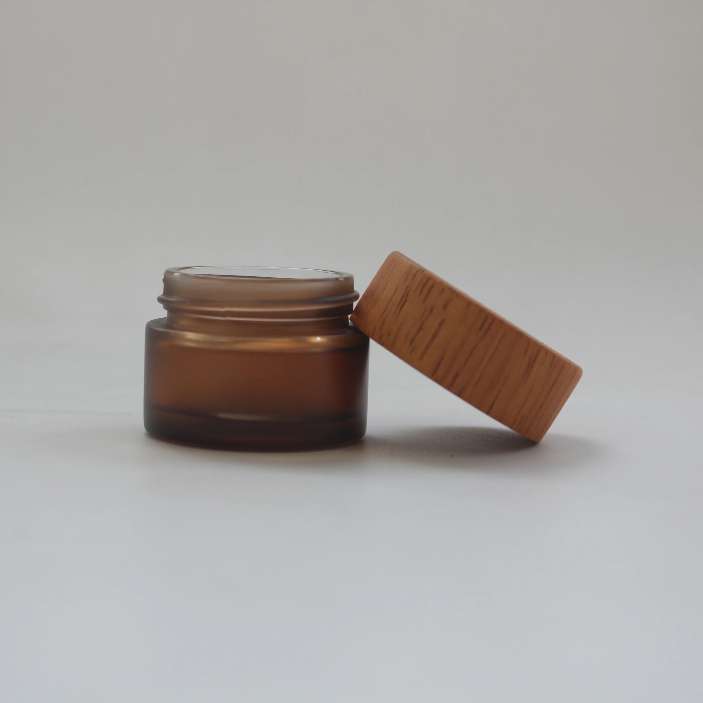 1oz 2oz 4oz frosted amber cosmetic glass skincare jar with wooden bamboo lid face cream jar storage jars with engraved logo