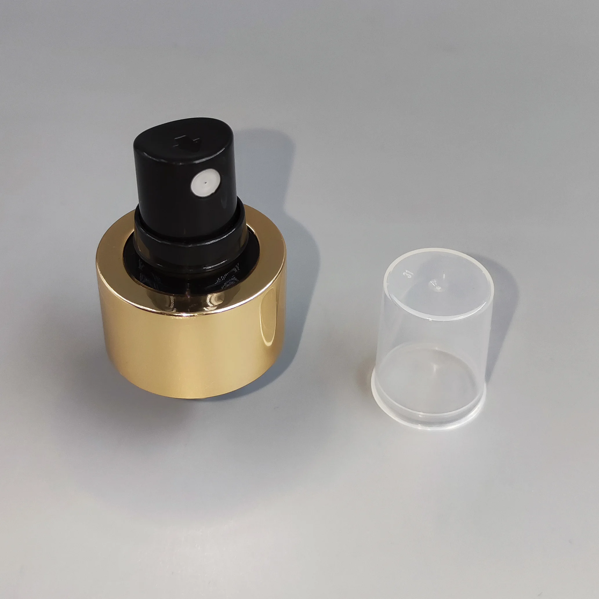 hot sell 24/410 gold color fine mist sprayer pump with clear cover aluminum spray caps fine mist spray pump spray