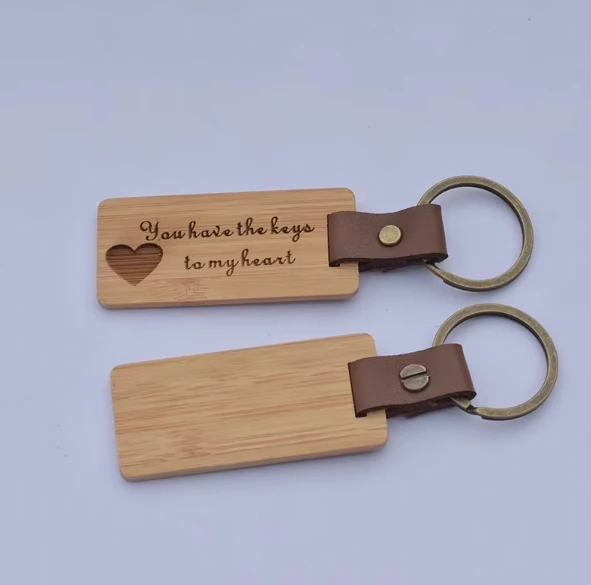 Factory direct selling 100% natural organic cute carving bamboo keychain plus logo key ring tags