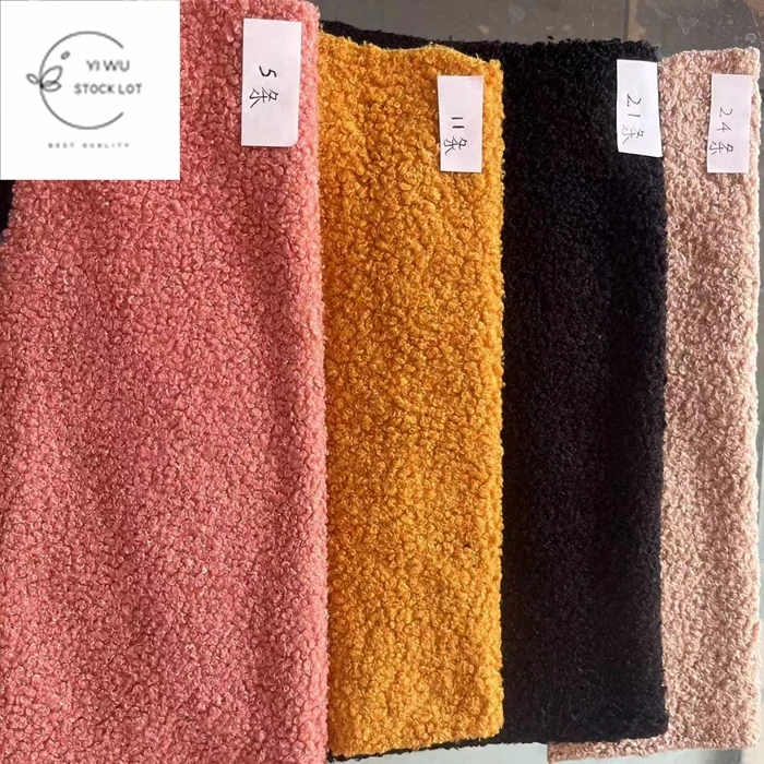 China Keqiao cheap polar fleece mixed teddy fabric for garment in stock lot.