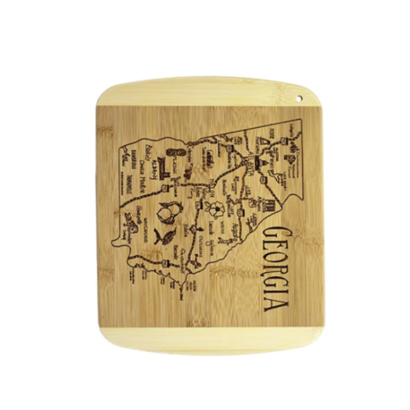 A bamboo cutting board with a laser pattern on a Georgia city