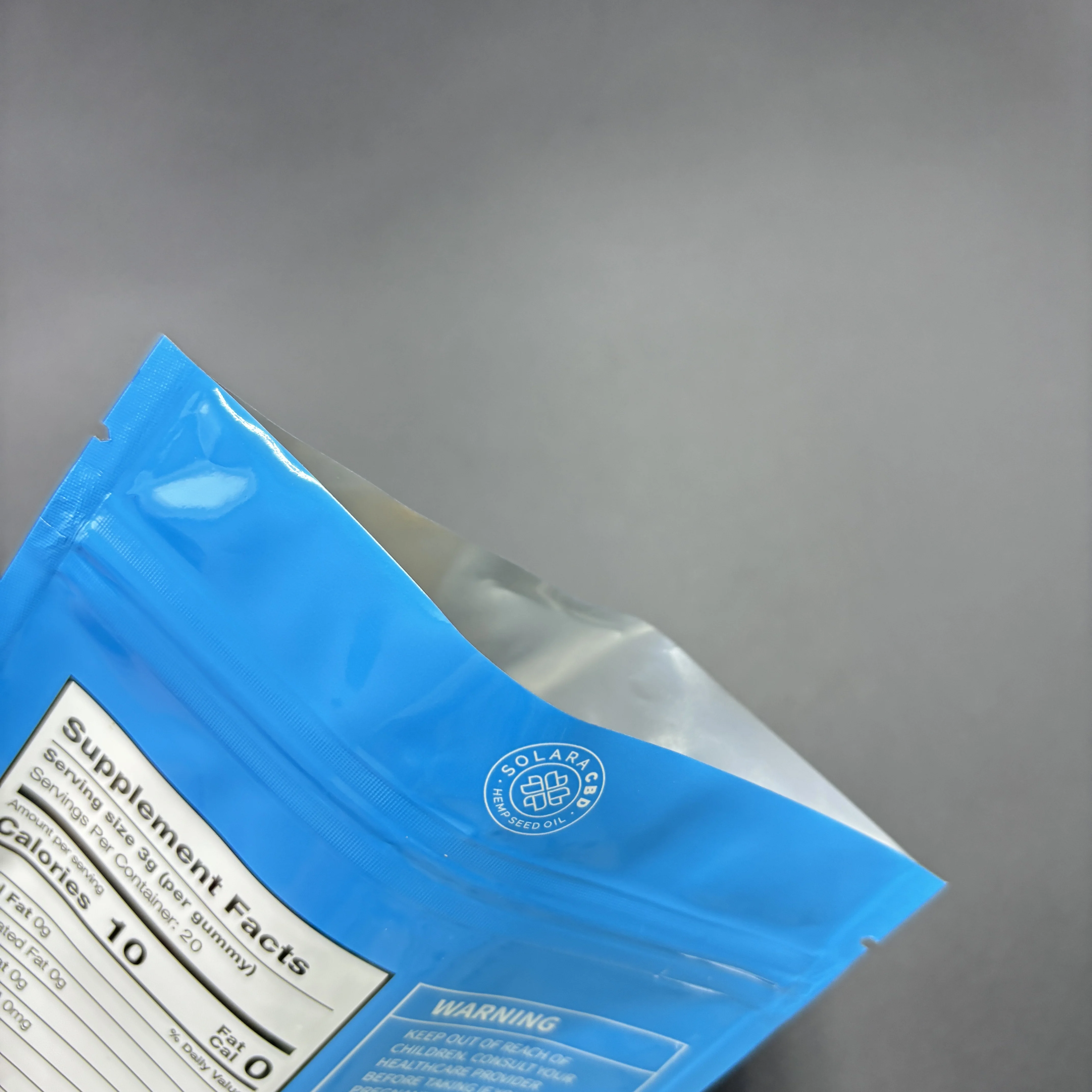 Custom three side seal glossy finished  printing packaging 20g cotton face mask pouch bag bottom open