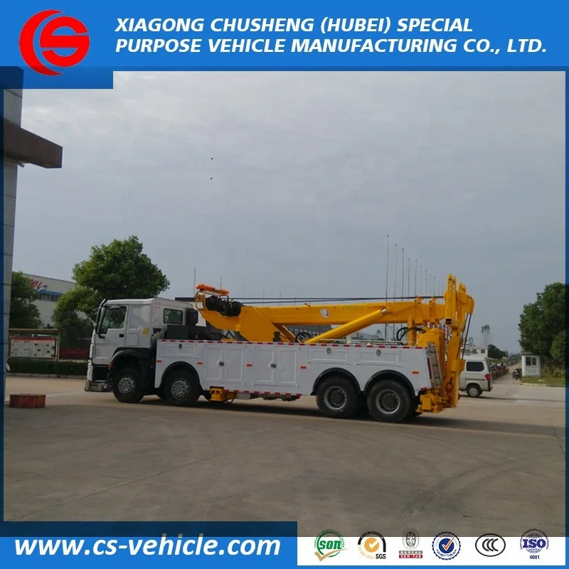 HOWO 360 degree rotation Crane 30tons Lifting 12 wheel heavy duty wrecker tow truck for sale