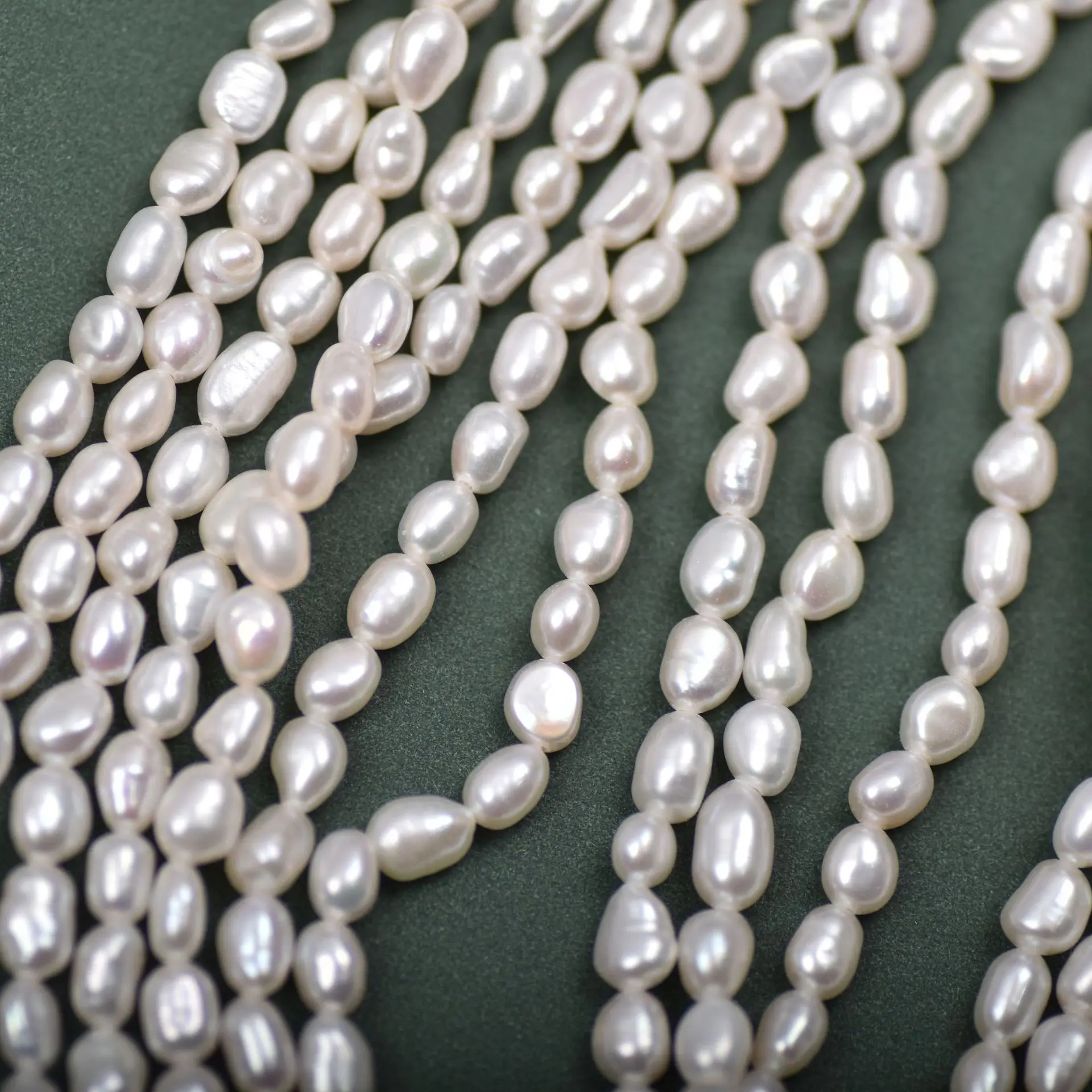 Natural Freshwater Pearls 3-4mm Natural Shiny Freshwater Rice Pearl String Wholesale