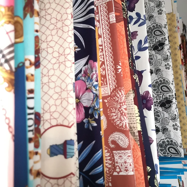 
New fashion customized woven rayon viscose printed stock lot fabric for dress materials 