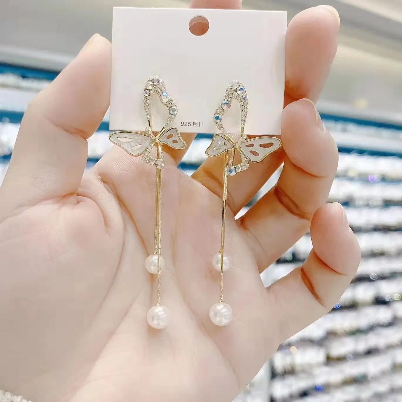 Fashion Jewelry Earrings View Share Korean diamond inlaid Butterfly Pearl Tassel Earrings New Niche design tempe