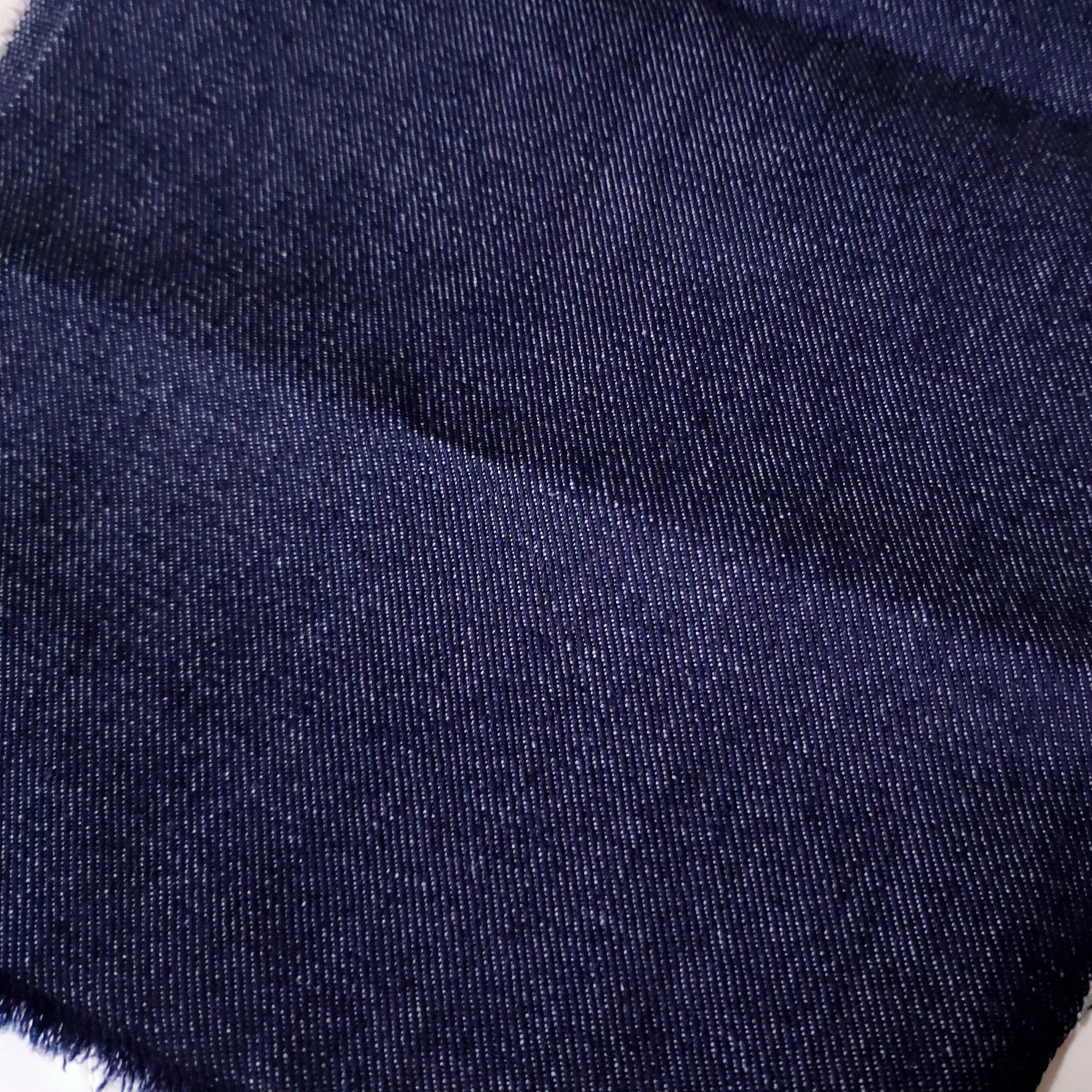 
China Denim Factory Wholesale 12oz Low Price Thickened Elastic Free Material Top Raw Fabric Denim 