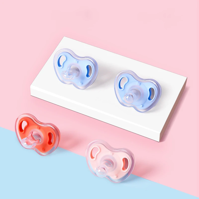 wholesales Ultra-Light Silicone Pacifier Symmetrical One-Piece Design BPA-Free Silicone Binkies for infant babies