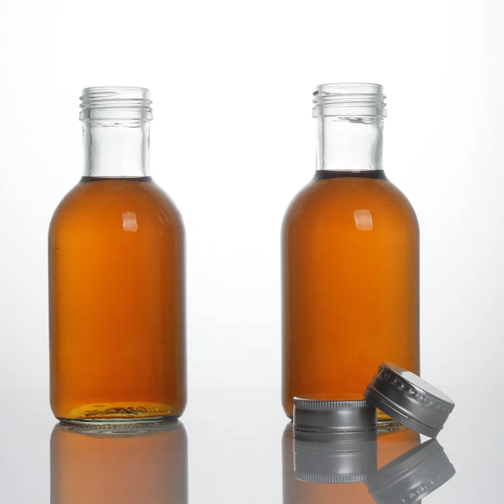 Stocked round clear empty 350ml glass bottle for beverage drinks 120oz fruit juice glass bottle