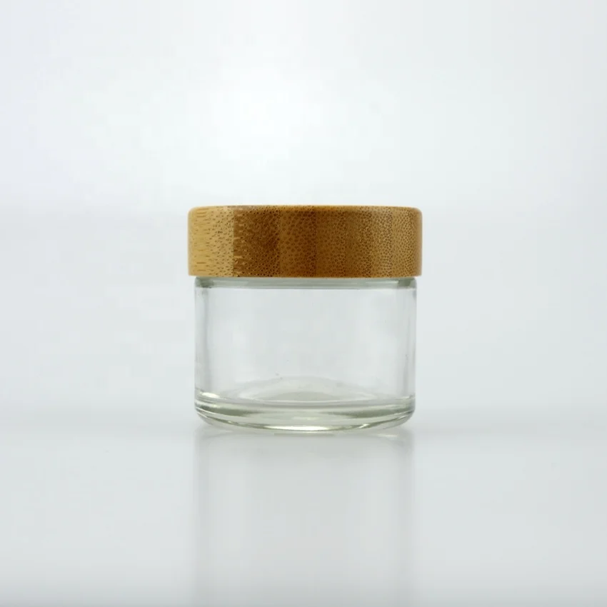
Wholesale 1oz 2oz 3oz 4oz 5g 7g 9g child proof bamboo lid with glass jar/container with childproof lid 