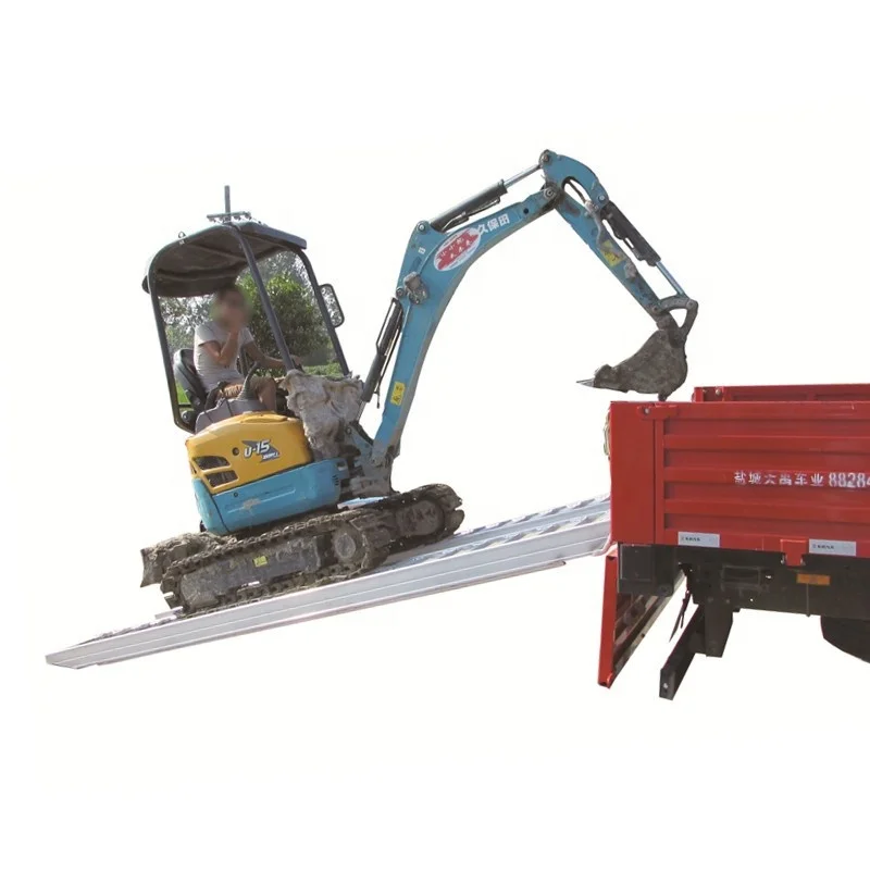 Heavy duty aluminum loading ramps used for Kobuta and Bobcat rubber tracked excavators