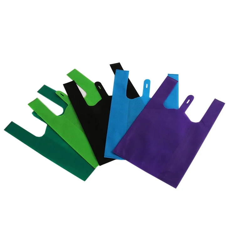 Hot selling eco friendly reusable non woven vest  t shirt carry bag with logo