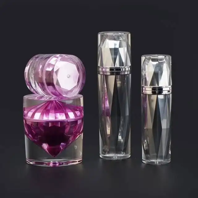 2023 New Arrival Unique Cosmetic Packaging Luxury Acrylic Plastic Skin Care Airless Lotion Cream Pump   With Diamonds Style Jar
