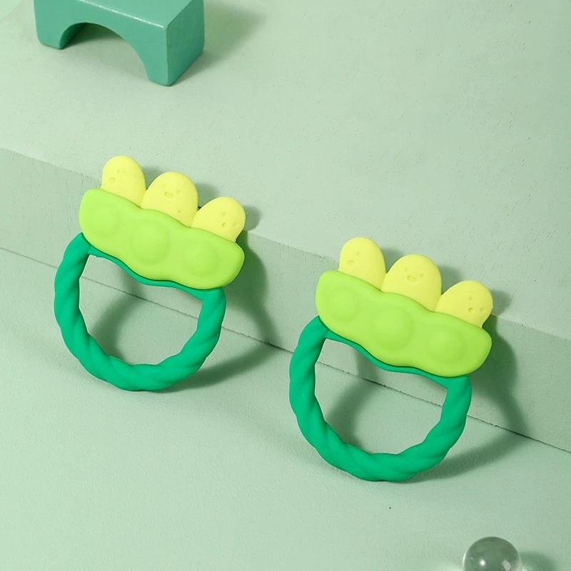 Circular liquid silicone pea shaped baby tether