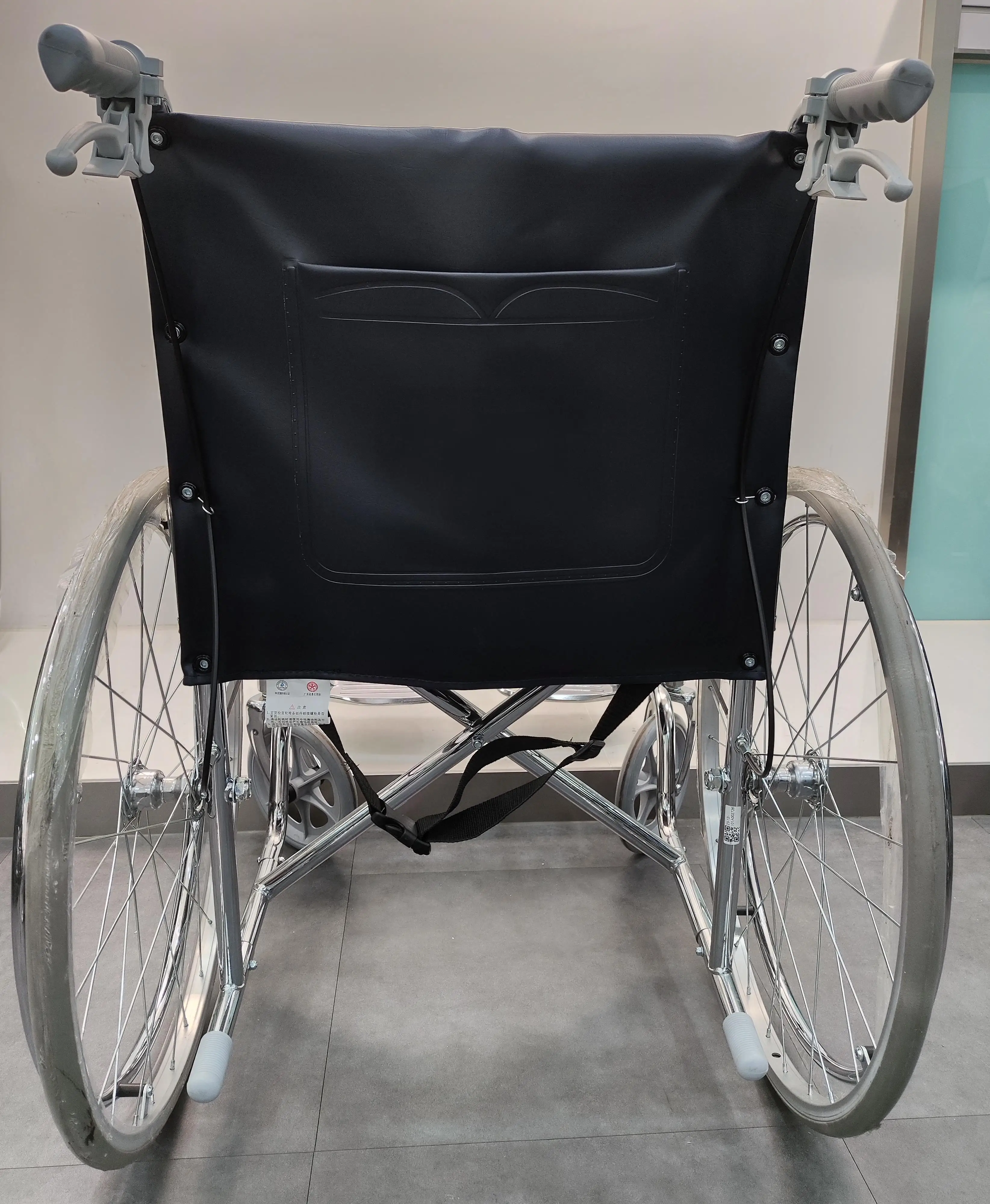 Cheap Economic Steel Wheelchair for Disabled, Fixed Arms Footrest, Portable Standard Folding Manual Wheel Chair