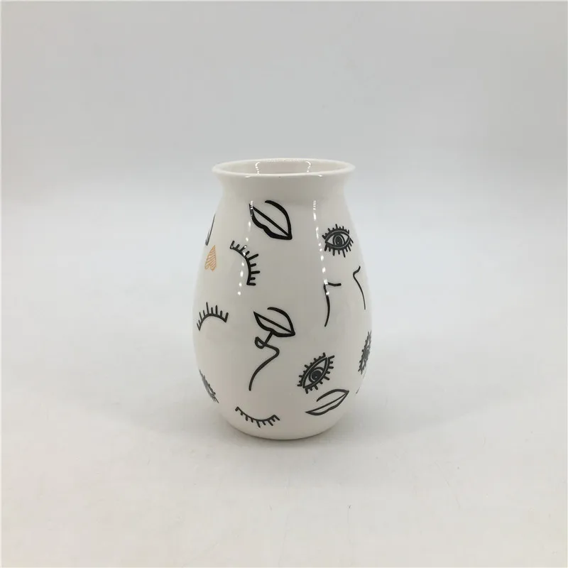Nordic ins Modern ceramic flower container white and black human face vase for home decor