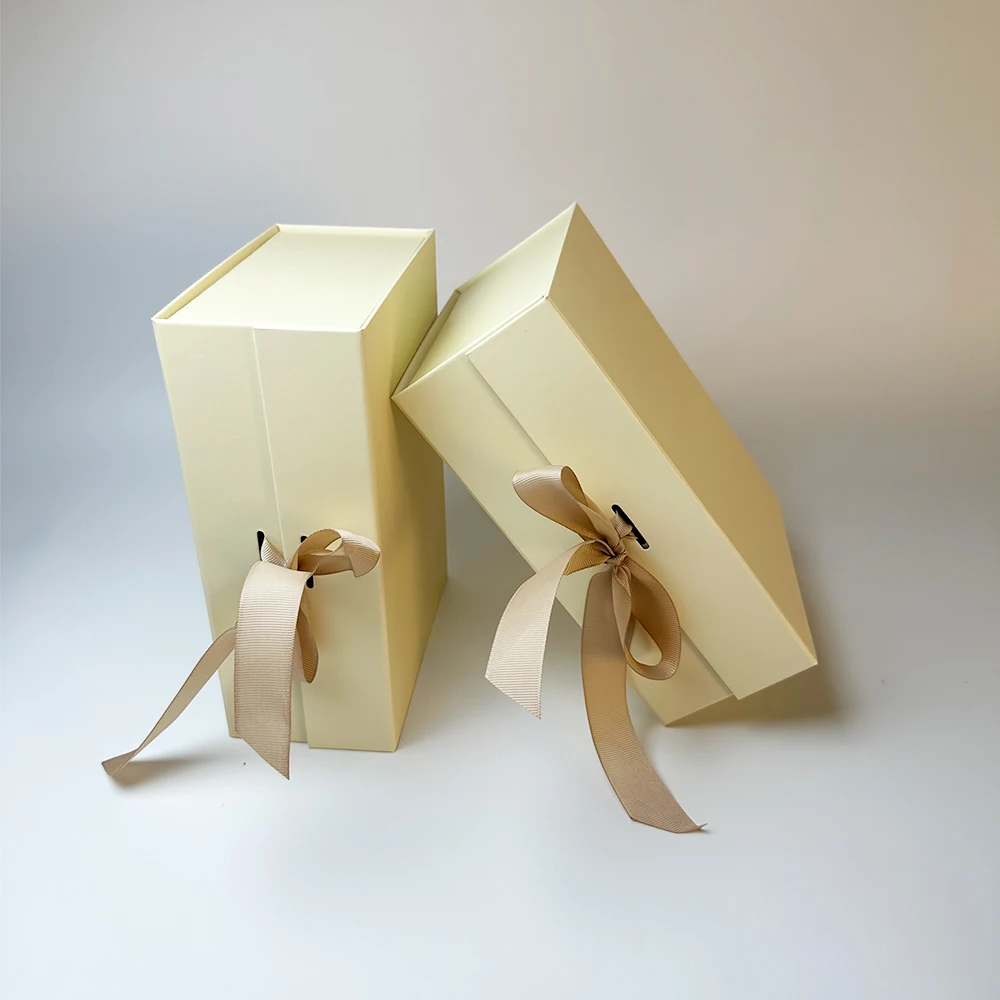 Hot Selling Creative Flap Gift Boxes Magnetic Folding Packaging Boxes UV Bump Design Customized Gift box with Ribbon