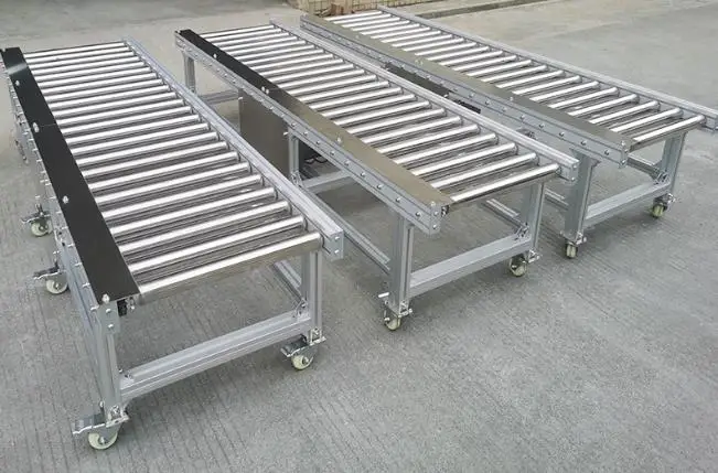 Automatic slide unloading stainless steel power transfer table roller conveyor