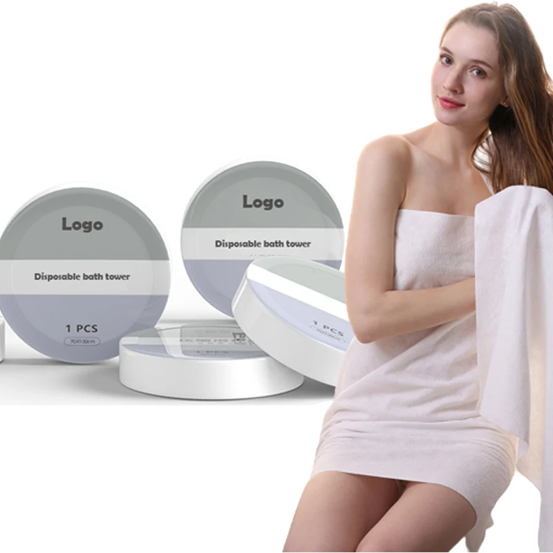 Whole hotel sale white large individual pack non-woven disposable  dry compressed cotton bath foam towels for hotels and travel