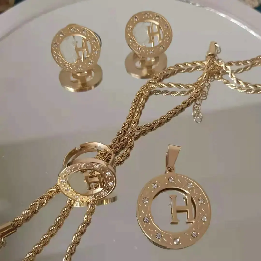 Stainless Steel Carved Vacuum Plated Brand Diamond Sets Including Necklaces, Rings, Earrings And Bracelets