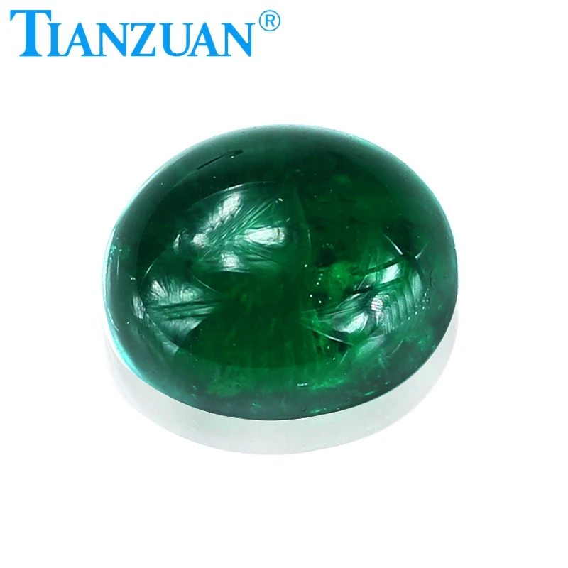 Oval shape flat back cabochon Hydrothermal emerald green color including minor cracks inclusions loose gem stone