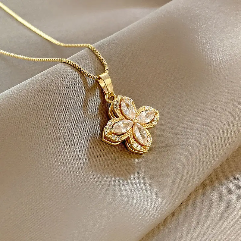 2023 Gold Plated Rotatable Four-leaf Clover Steel Chain Necklace Ring Pinwheel Stud Earrings Set
