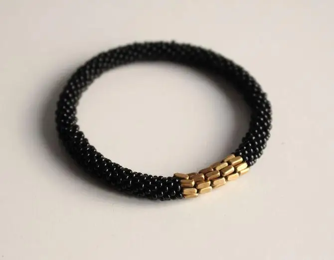 
Stylish Golden Metal Crocheted Czech and Japanese Beads Bracelet 