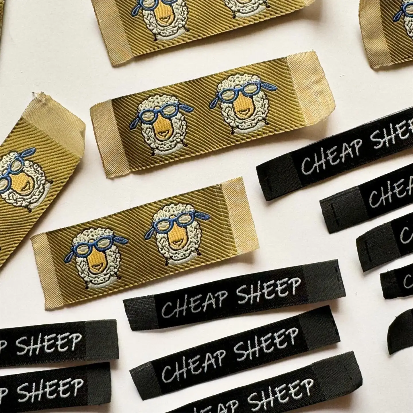 Custom Brand Name Clothing Sewn Logo Stitching Garment Woven Label for Textile Products