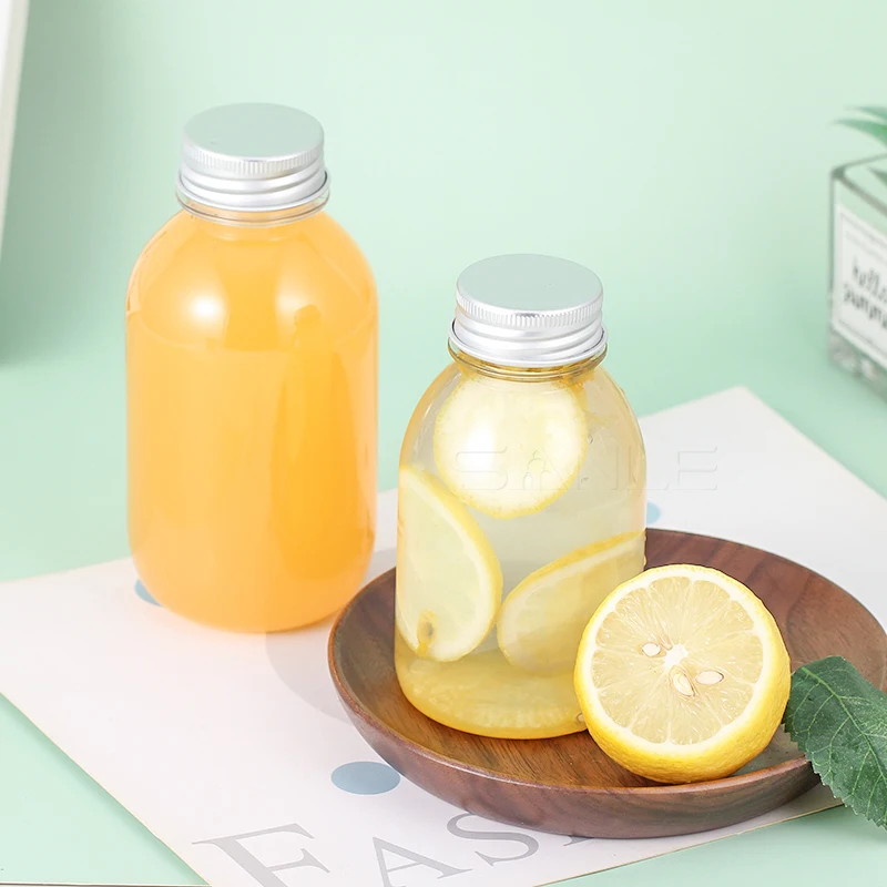 Wholesale Beverage Bottle 8oz  16oz Pearl Milk Tea Bottle Pet Beverage Vodka  Energy Shot Juice Bottle with Lid