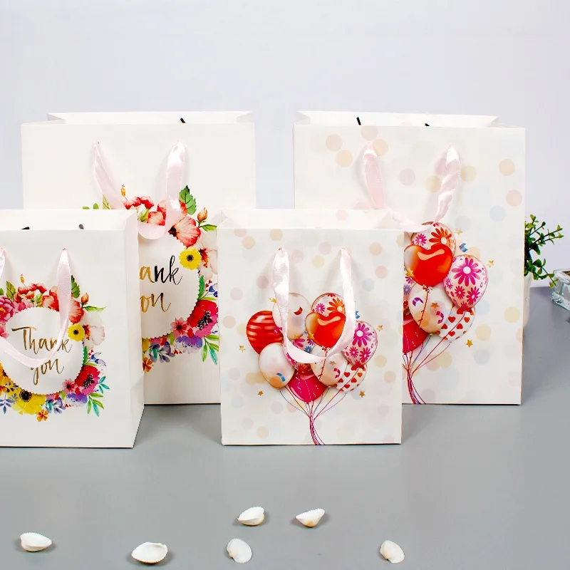 New boutique handbag bronzing craft gift bag  high-grade fancy white paper card fancy paper gift bag