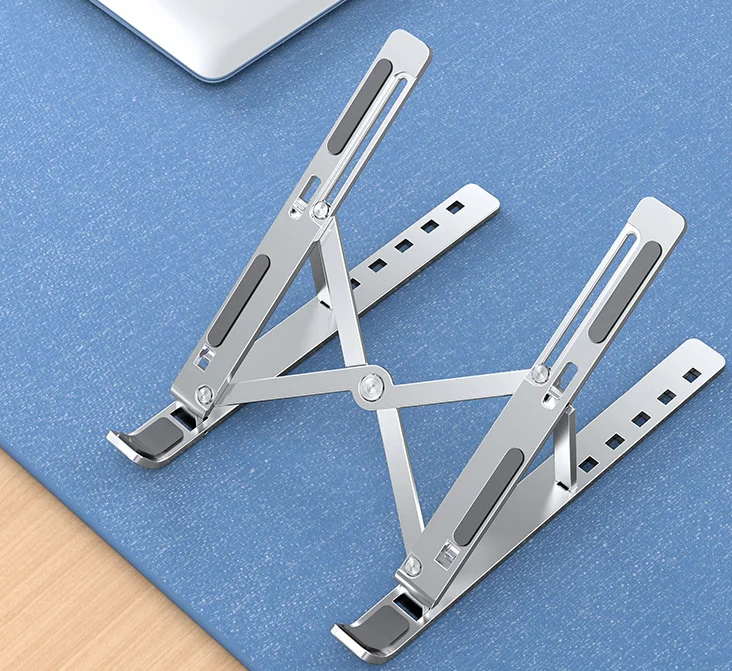 
Notebook bracket Aluminum alloy computer desktop heightening bracket heat dissipation folding portable storage base 