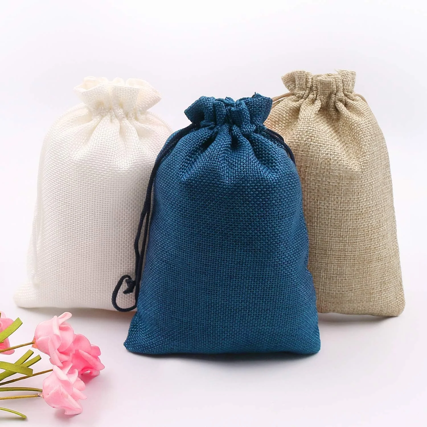 Cheap and portable drawstring burlap natural mini jute bag linen bag wholesale for jewelry jute gift pouch for wedding 9*7cm
