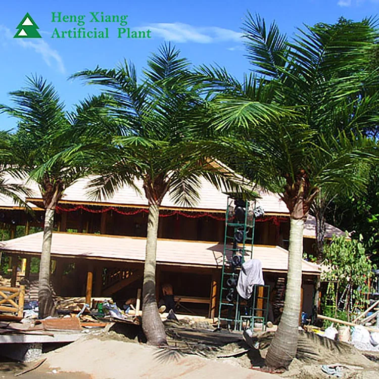 small fake indoor outdoor bend artificial coconut palm tree plants that look real