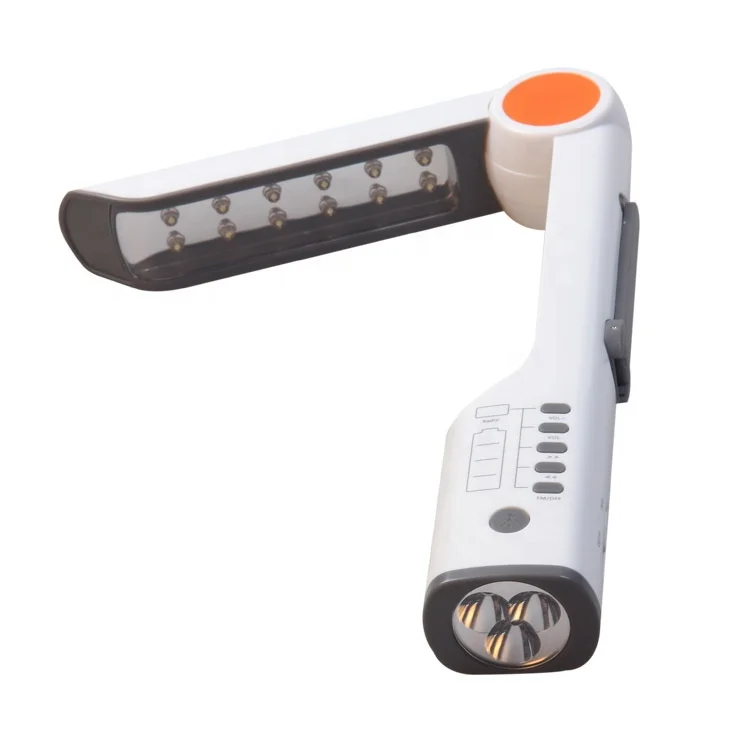 cheap multi-functional solar torch light with FM radio small desk lamp