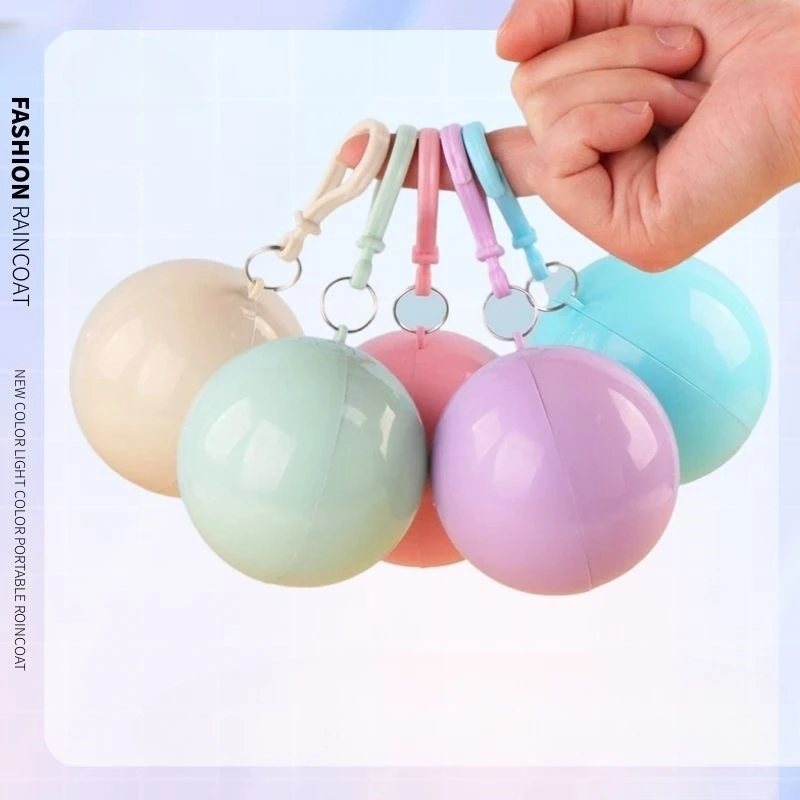 Wholesale PE Disposable Ball Raincoat Outdoor Camping Cheap Rain Wear Key Chain Touring Convenient Rainfreem Ball Raincoats