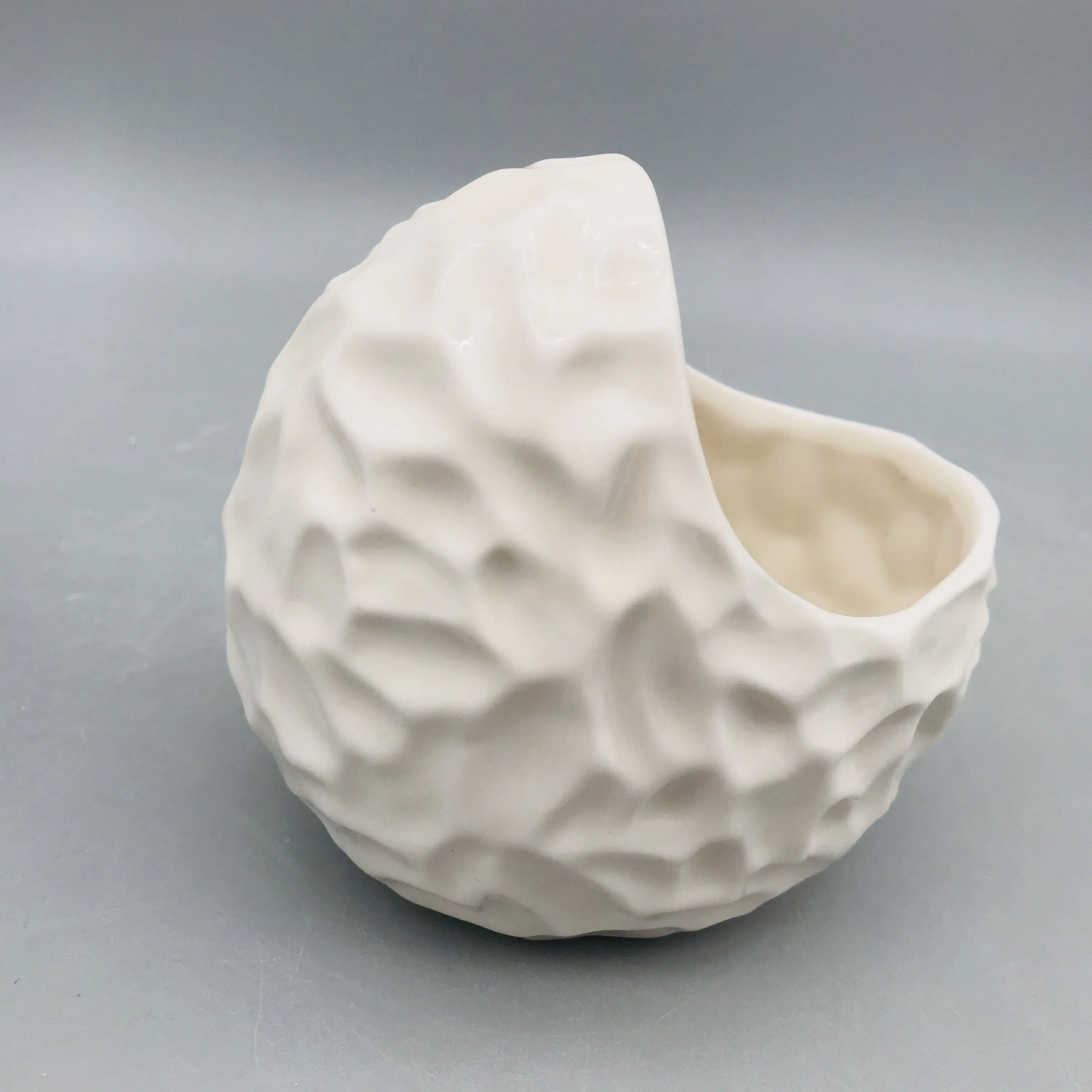 Original design irregular shape white porcelain pot for kitchen